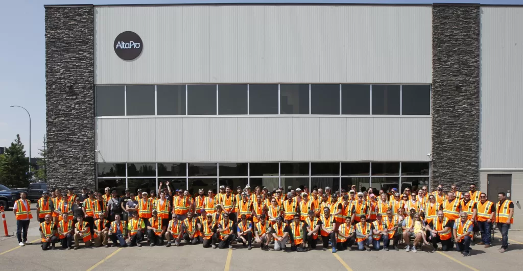 AltaPro Workers standing in front of AltaPro Office